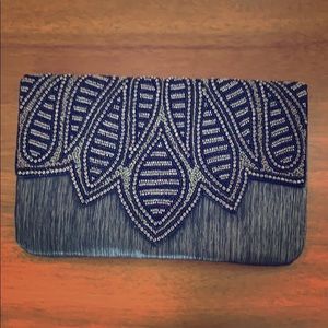 Grey beaded metallic clutch